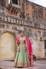 PISTA GREEN EMBROIDERED TISSUE LEHENGA