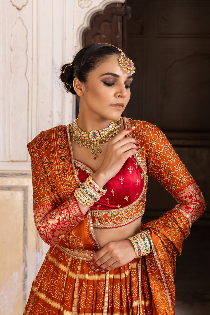 GINGER ORANGE GAJI SILK PRINTED LEHENGA